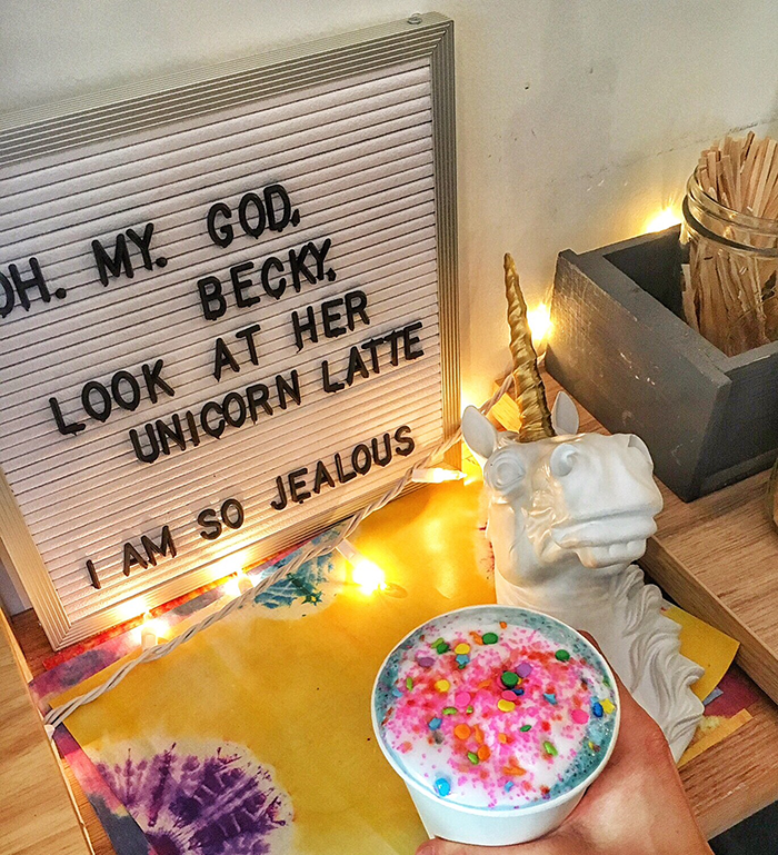 unicorn latte with sign